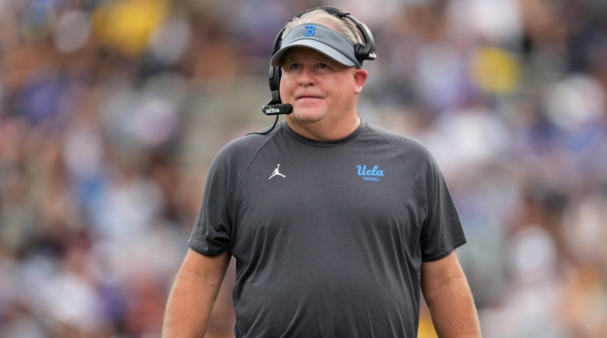 UCLA coach Chip Kelly stands on the sideline