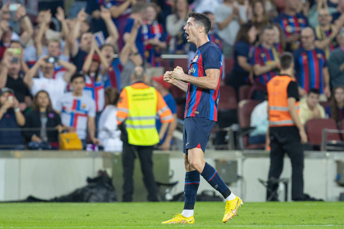 Robert Lewandowski pictured celebrating after scoring a goal for Barcelona against Villarreal in October 2022