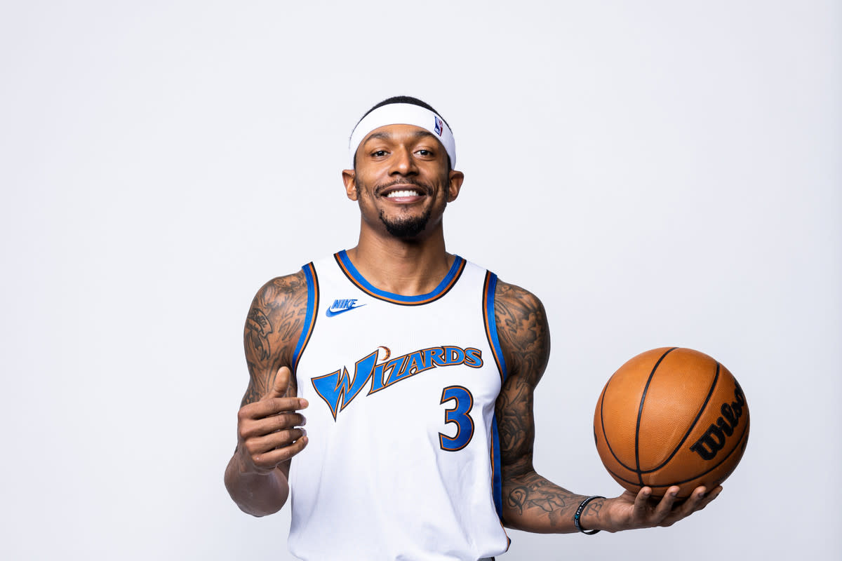 Bradley Beal showing off the throwback uniforms- Monumental Sports & Entert