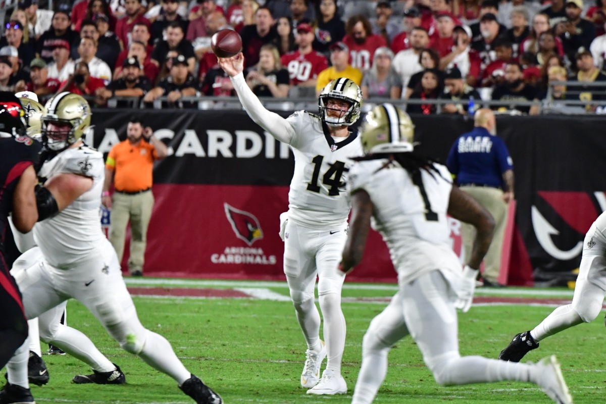 New Orleans Saints quarterback Andy Dalton (14) throws against the Arizona Cardinals. Mandatory Credit: Matt Kartozian-USA TODAY Sports
