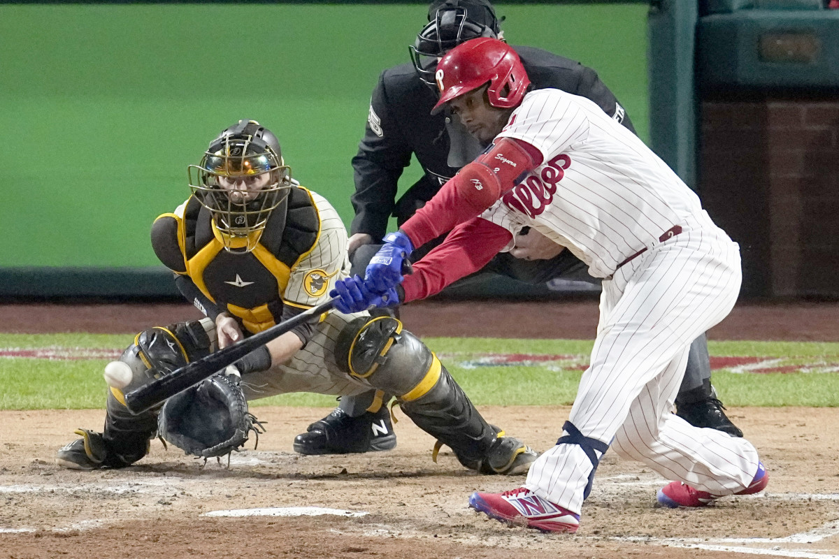 Phillies second baseman Jean Segura golfs a go-ahead two-run single in the fourth inning of NLCS Game 3 against the Padres.