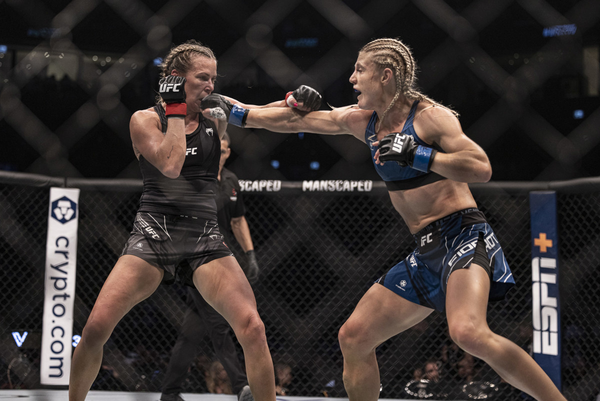 Katlyn Chookagian (red gloves) and Manon Fiorot (blue gloves) during UFC 280 at Etihad Arena.