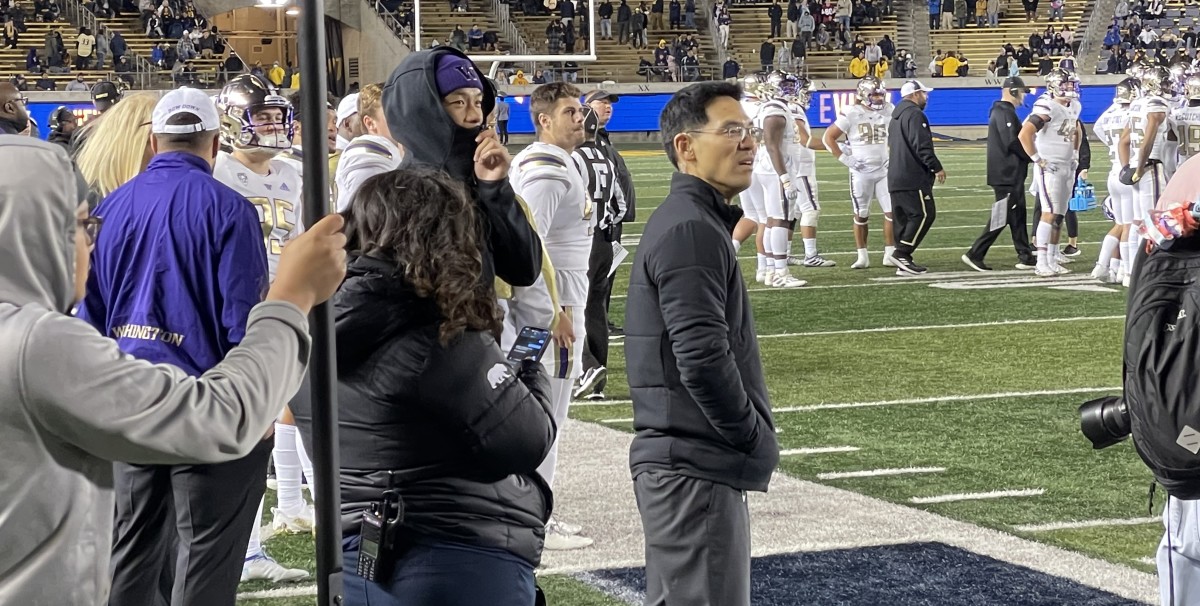 Kamren Fabiculanan stands in street clothes, injured in the second half at Cal.