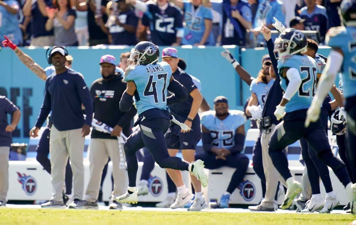 Tennessee Titans safety Andrew Adams (47) runs in a touchdown off an interception against the Indianapolis Colts during the second quarter at Nissan Stadium Sunday, Oct. 23, 2022, in Nashville, Tenn. Syndication The Tennessean