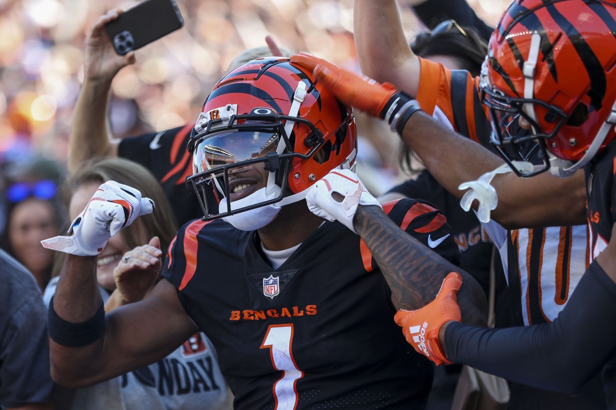 Oct 23, 2022; Cincinnati, Ohio, USA; Cincinnati Bengals wide receiver Ja'Marr Chase (1) reacts after scoring a touchdown against the Atlanta Falcons in the first half at Paycor Stadium. Mandatory Credit: Katie Stratman-USA TODAY Sports