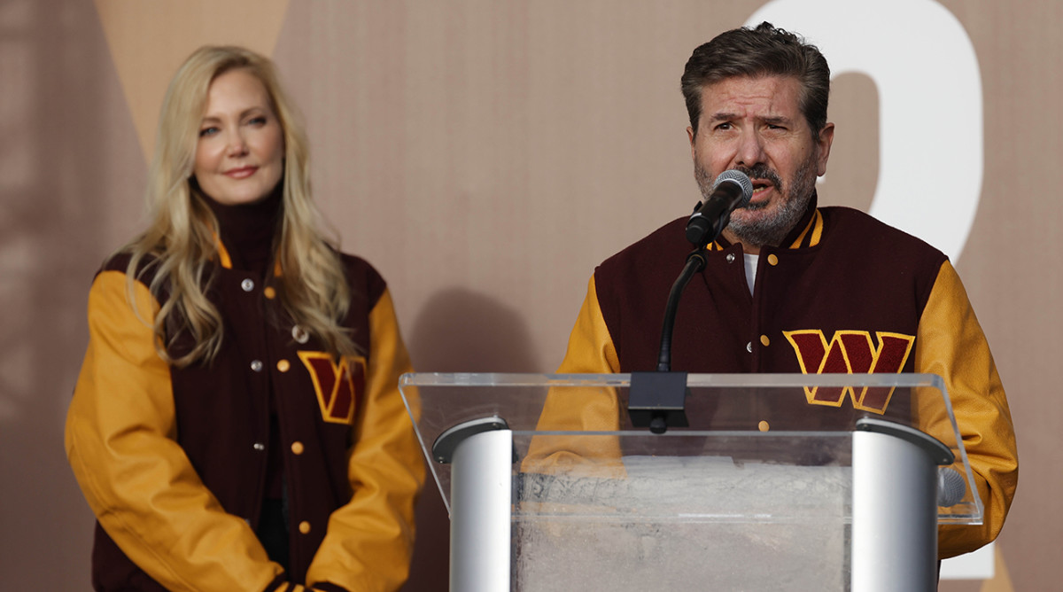 Commanders co-owners Dan (right) and Tanya (left) Snyder during a press conference.