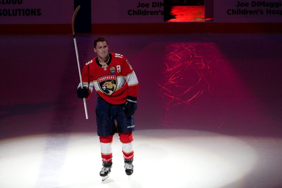 Oct 19, 2022; Sunrise, Florida, USA; Florida Panthers left wing Matthew Tkachuk (19) celebrates on the ice after being named one of the games three stars in the win over the Philadelphia Flyers at FLA Live Arena. Mandatory Credit: Jasen Vinlove-USA TODAY Sports