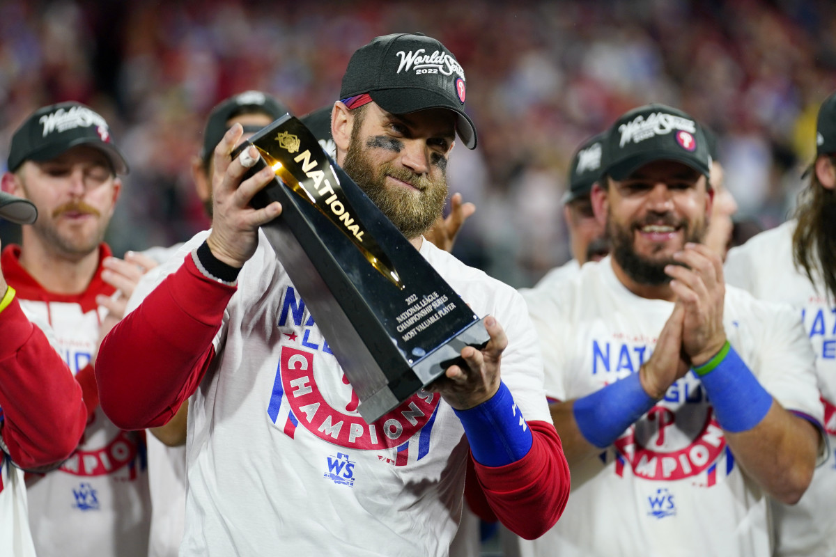 Phillies slugger Bryce Harper holds the National League Championship Series MVP award.