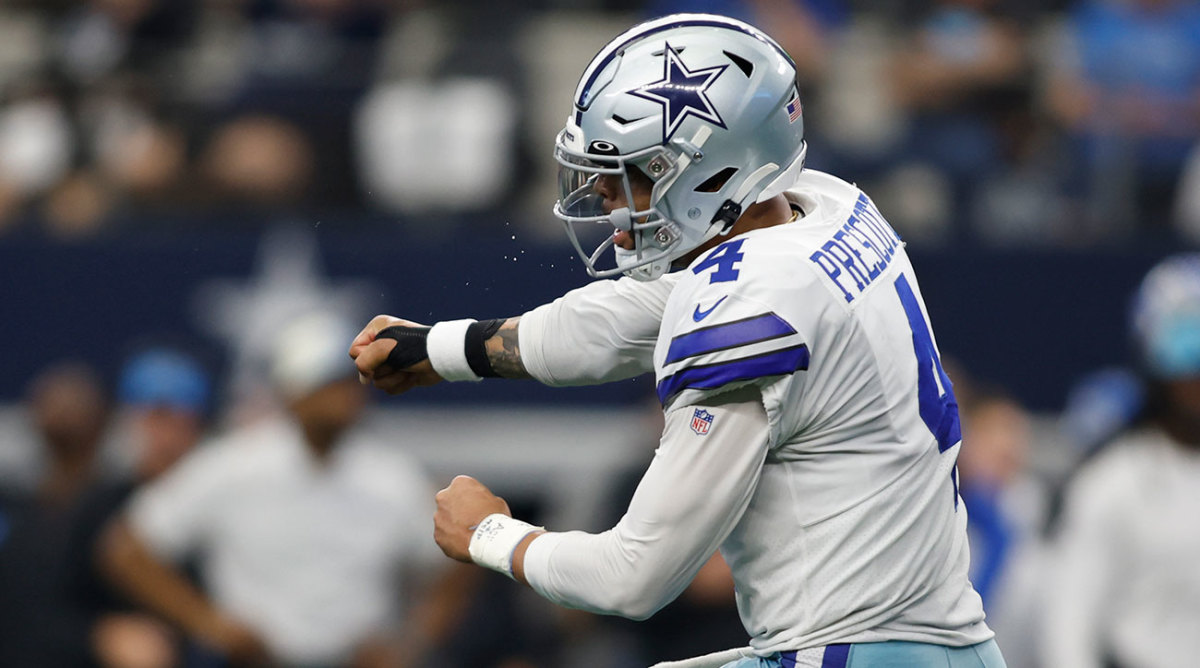 Dak Prescott celebrates in his first game back from injury.