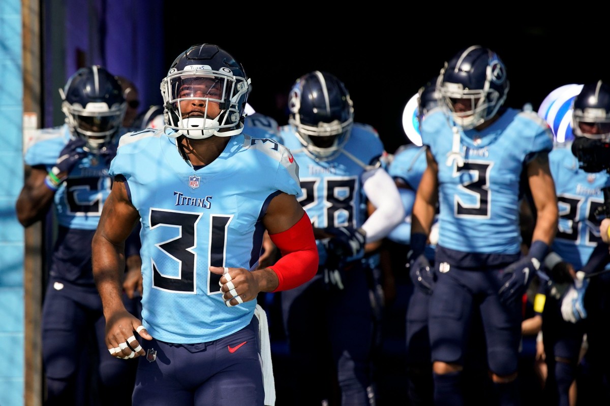 Titans safety and captain Kevin Byard leads his team onto the field in Week 7 against the Colts.
