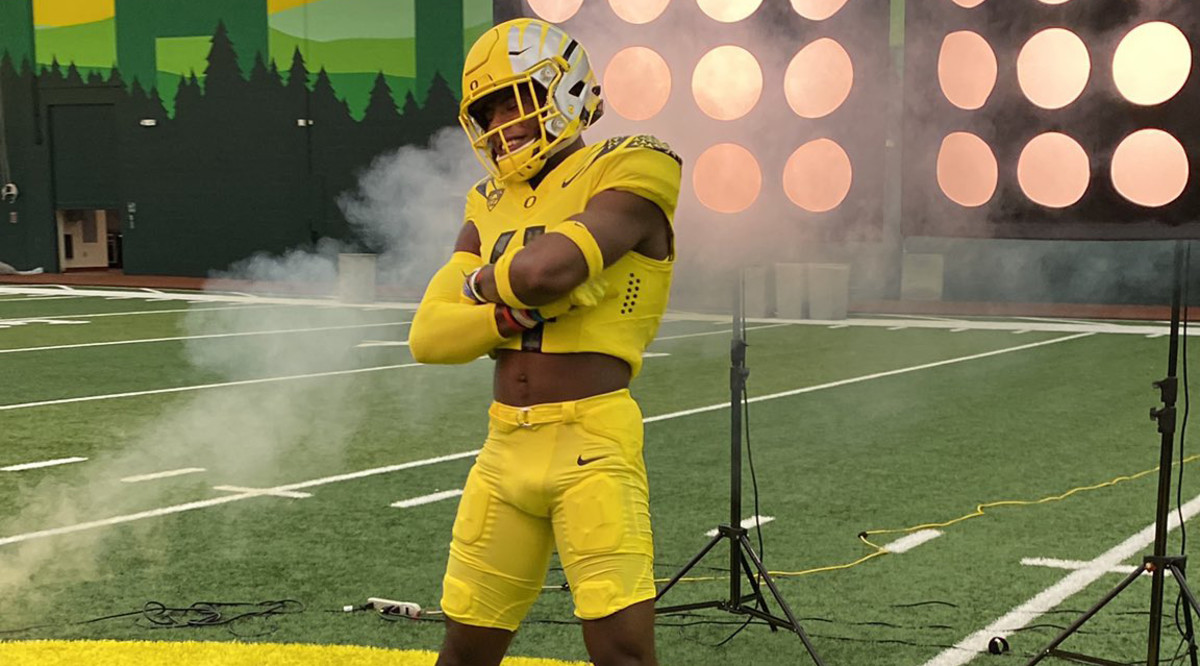 Justin Williams poses during a photoshoot on a visit to the University of Oregon.