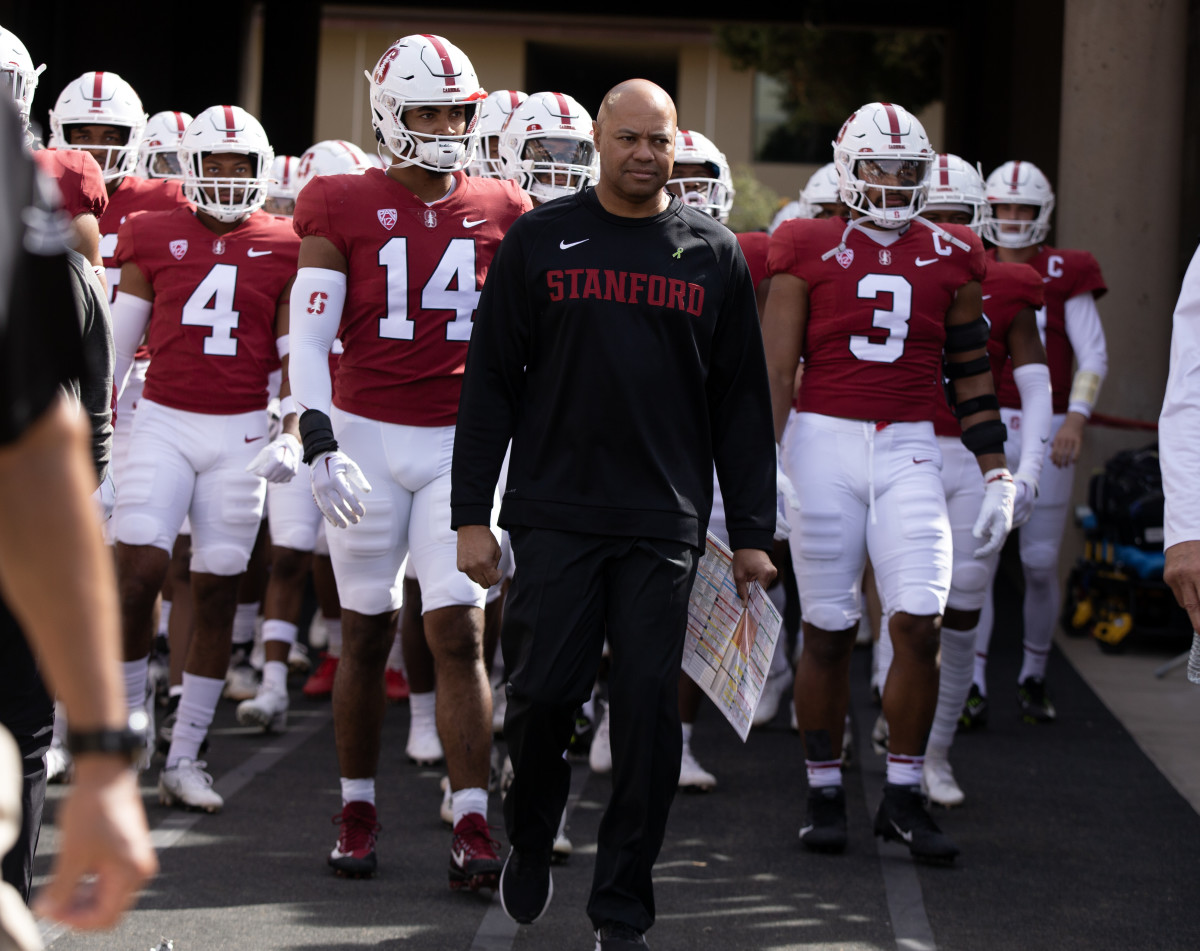 ; Stanford Cardinal head coach David Shaw leads players onto the field before the game against the Arizona State Sun Devils at Stanford Stadium.