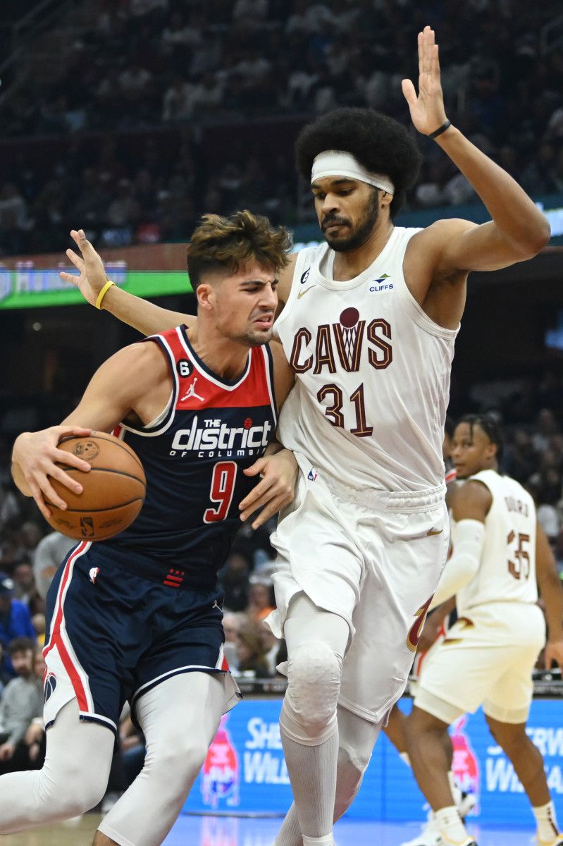 Deni Avdija taking Cavs Center Jarrett Allen off the dribble - USA Today