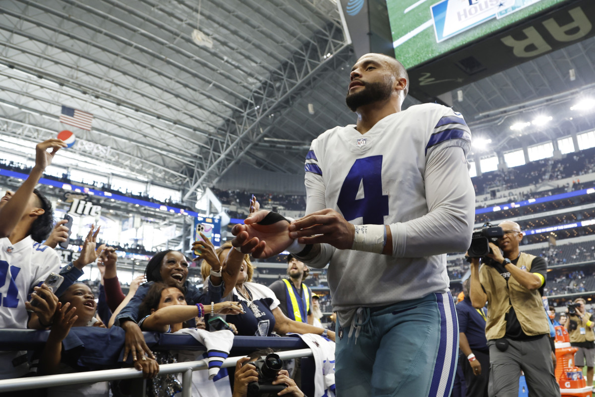 Dallas Cowboys quarterback Dak Prescott (4) leaves the field after the game against the Detroit Lions at AT&T Stadium.