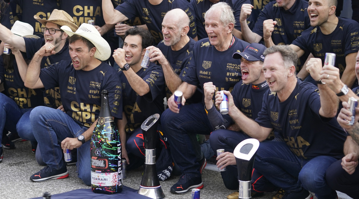Sergio Pérez and Max Verstappen celebrate with their team as Red Bull claims the constructors’ championship at the U.S. Grand Prix in Austin.