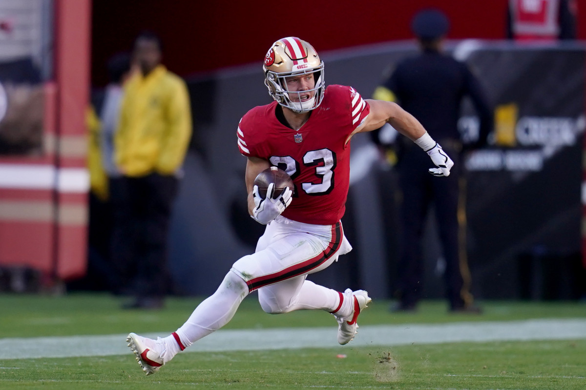 San Francisco 49ers running back Christian McCaffrey (23) runs with the ball against the Kansas City Chiefs in the third quarter at Levi's Stadium.