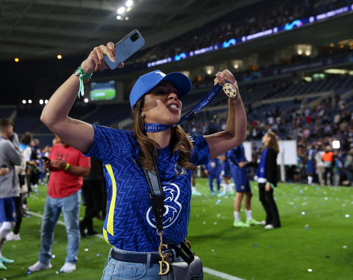 Belle Silva, wife of Thiago Silva, pictured celebrating with a Champions League medal around her neck after Chelsea's win over Manchester City in the 2021 final