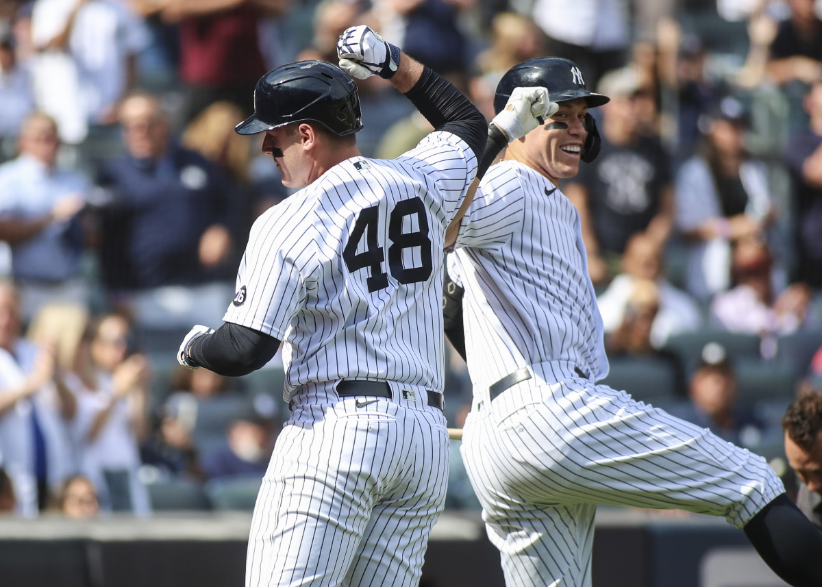 Yankees outfielder Aaron Judge and first baseman Anthony Rizzo celebrate a home run.