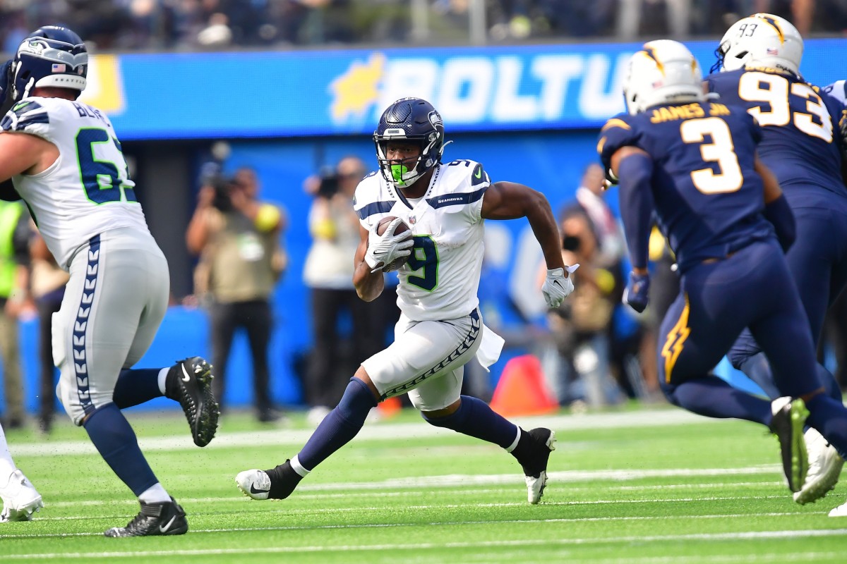 Oct 23, 2022; Inglewood, California, USA; Seattle Seahawks running back Kenneth Walker III (9) runs the ball against the Los Angeles Chargers during the first half at SoFi Stadium.