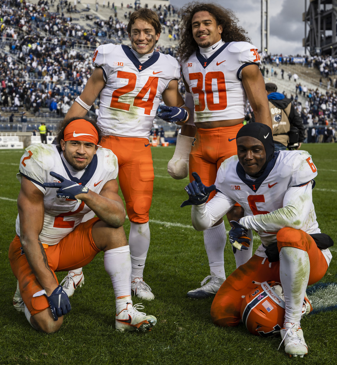 Chase (wearing No. 2) and Sydney (No. 30) with Illinois teammates.