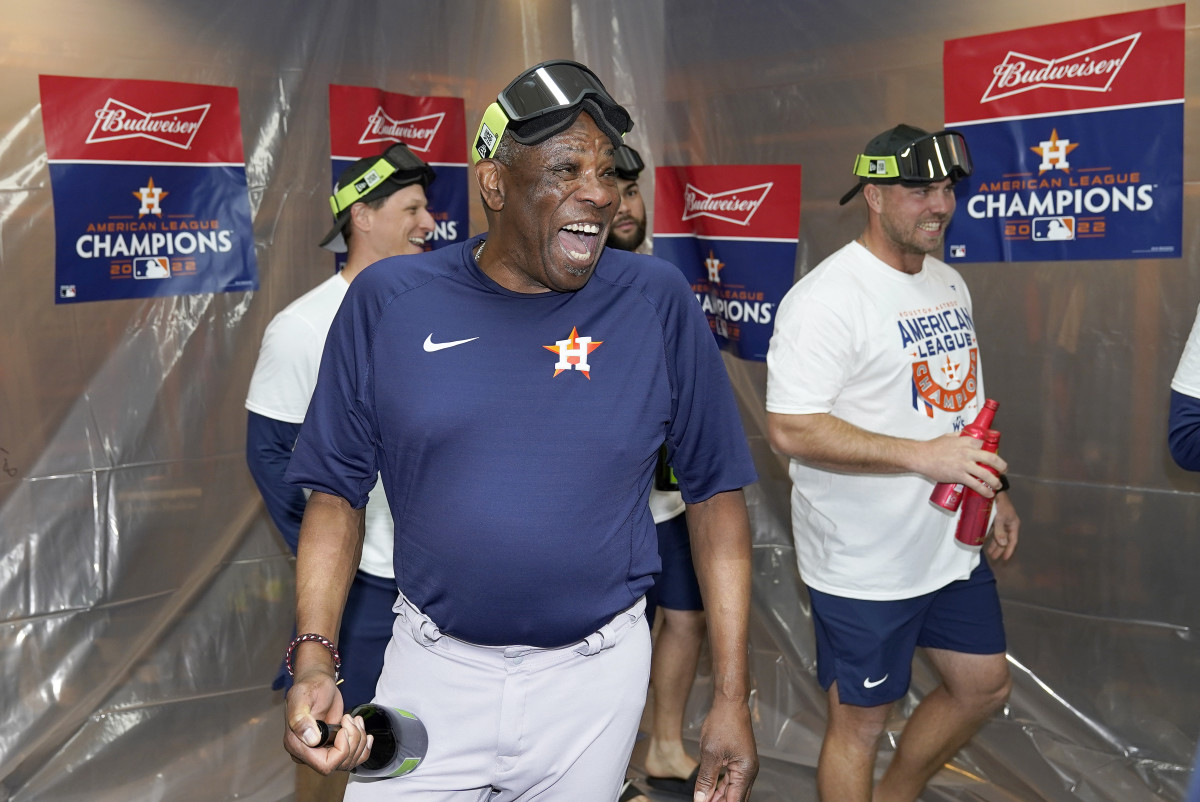 Astros manager Dusty Baker Jr. celebrates with his team after defeating the Yankees in Game 4 to win the American League Championship Series.