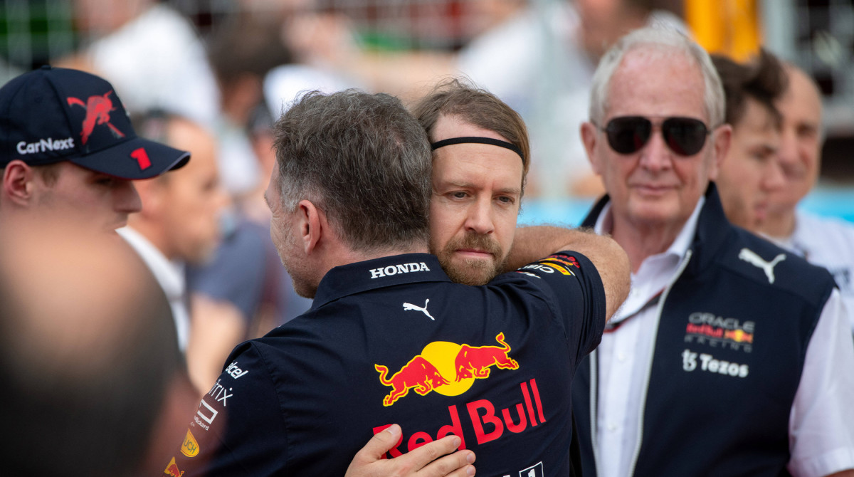 Sebastian Vettel hugs Red Bull’s Christian Horner as the F1 grid mourns the late Dietrich Mateschitz in Austin.
