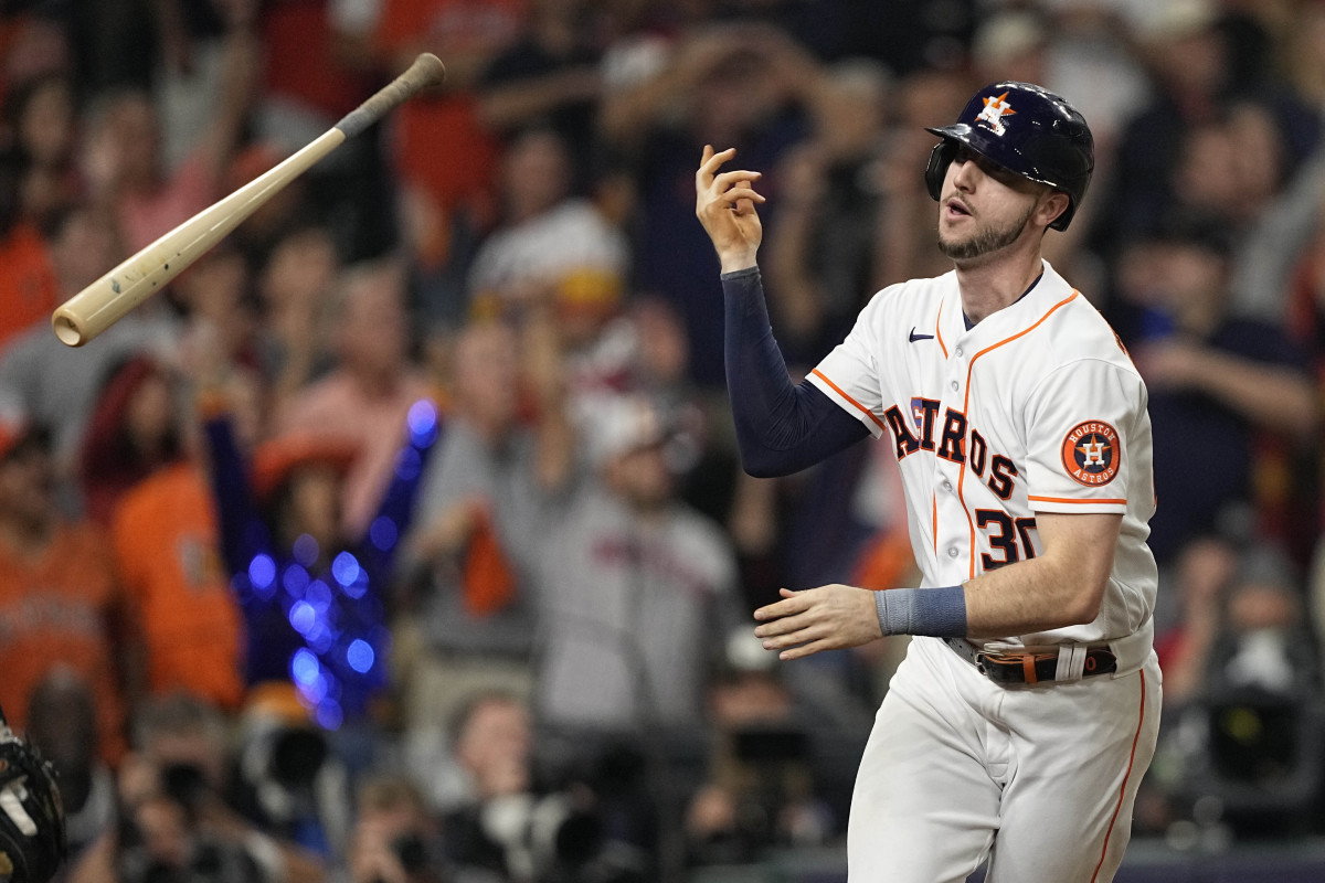 Astros' Kyle Tucker celebrates his three-run home run during the third inning in Game 1 of the World Series