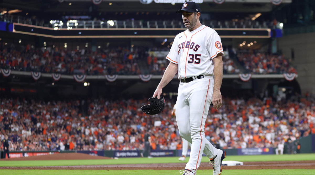 Astros starting pitcher Justin Verlander walks to the dugout.