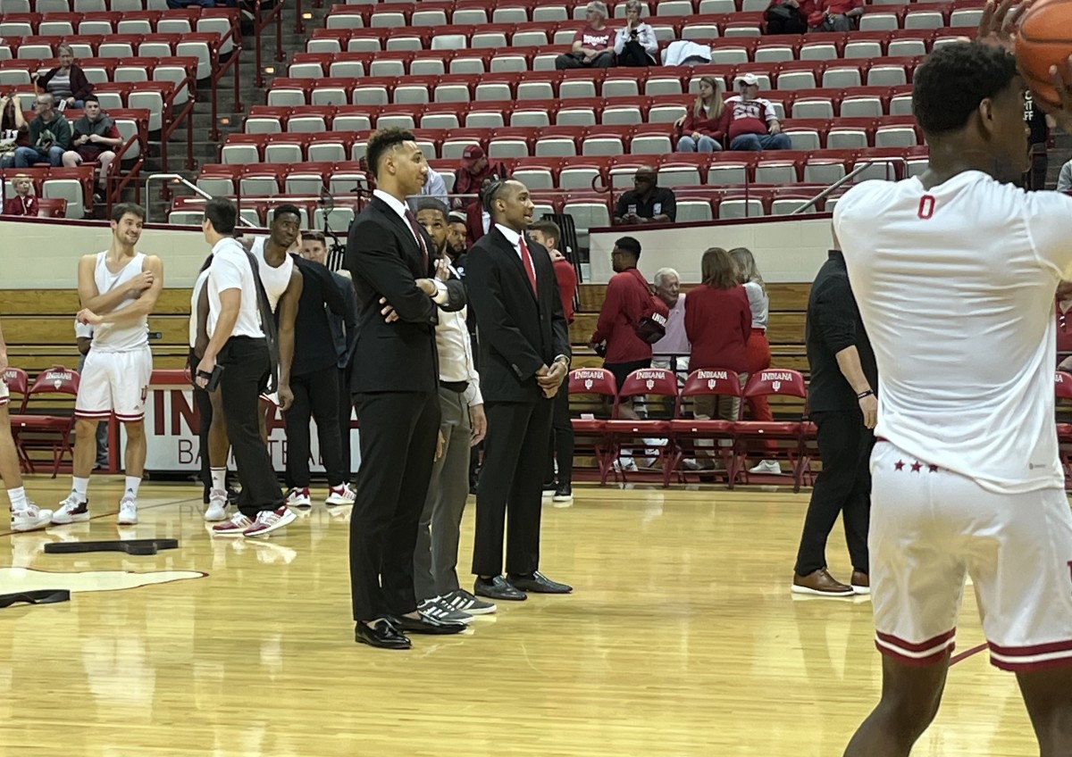 Indiana's Trayce Jackson-Davis and Tamar Bates wearing a suit and tie during pregame warmups on Saturday before an exhibition game against Marian University at 3 p.m. ET at Simon Skjodt Assembly Hall. 