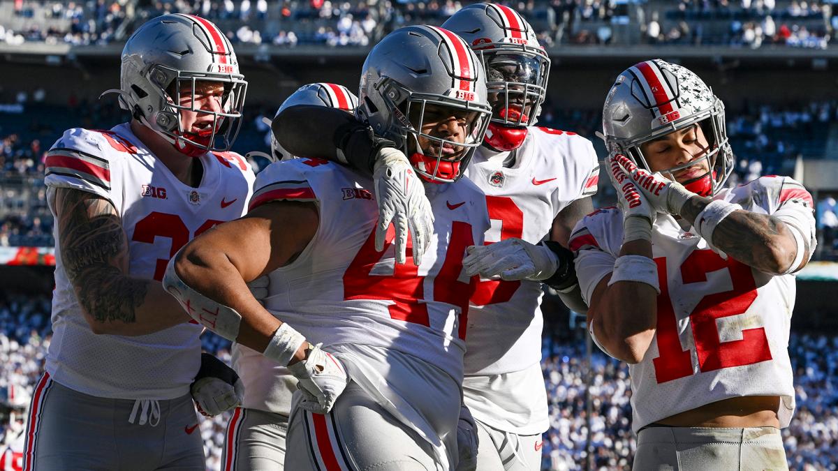 Ohio State defense, J.T. Tuimoloau, celebrates interception, Jack Sawyer, Zach Harrison, Lathan Ransom