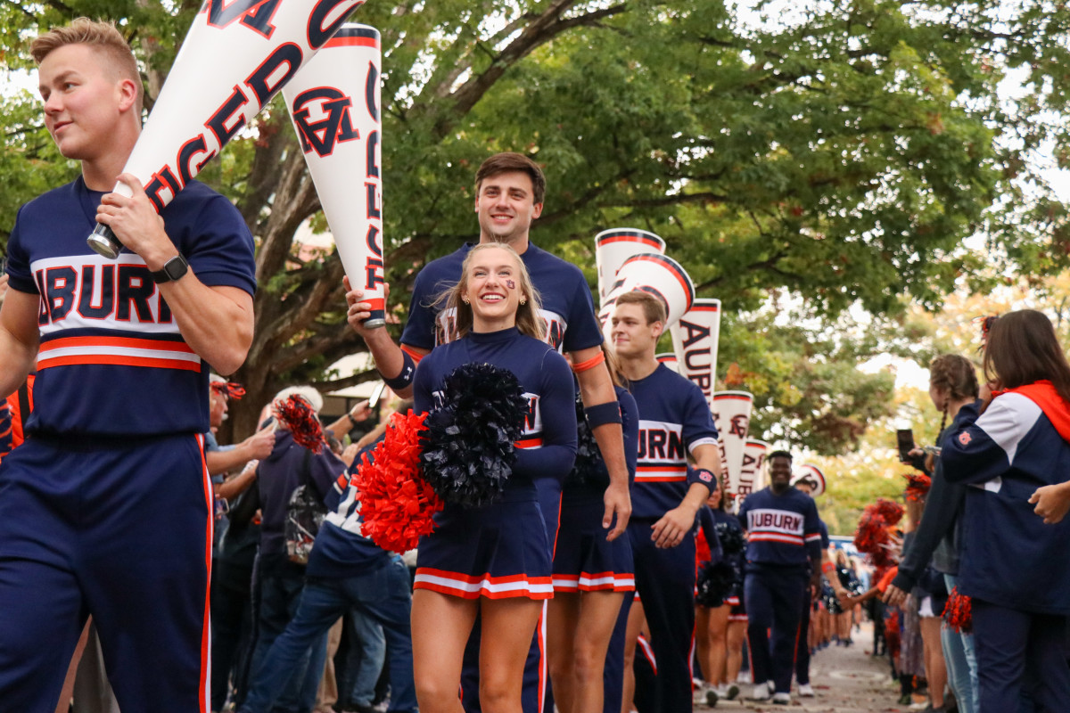 The Auburn Cheerleaders get the crowd hyped during Tiger Walk.