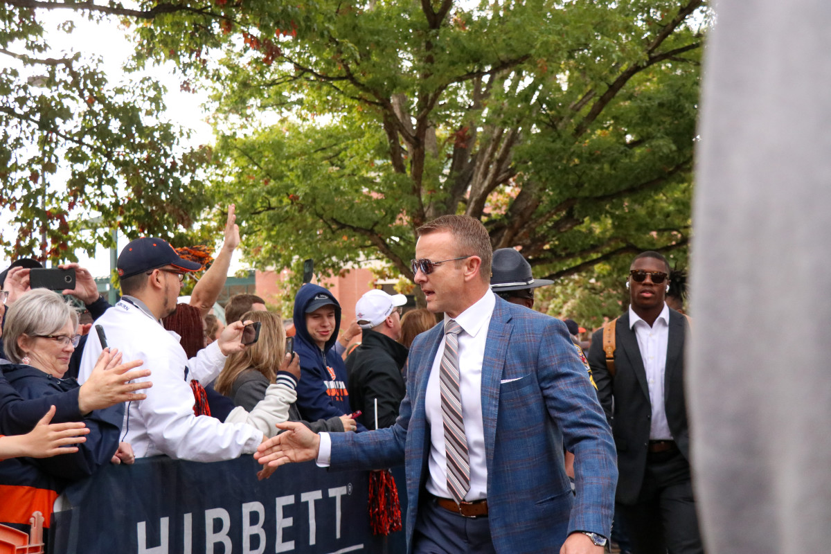 Bryan Harsin greets the Auburn fans at Tiger Walk