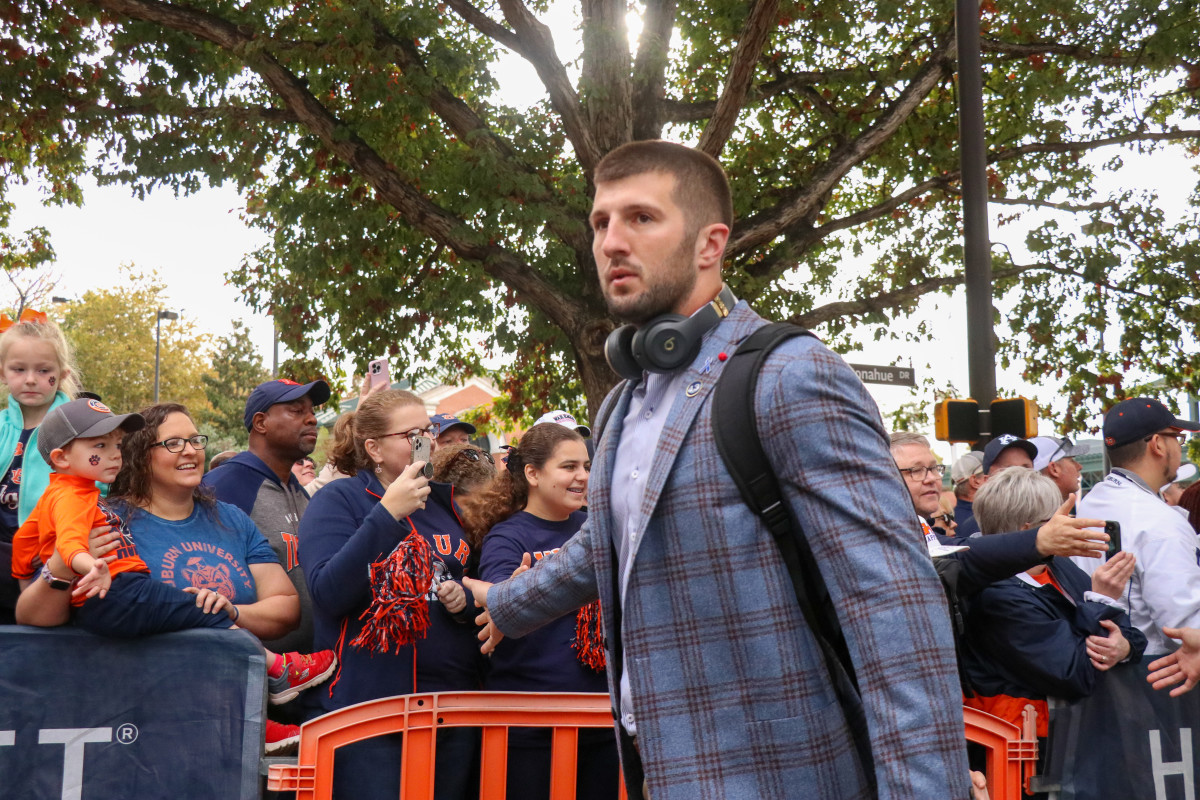 John Samuel Shenker greets the Auburn faithful during Tiger Walk.