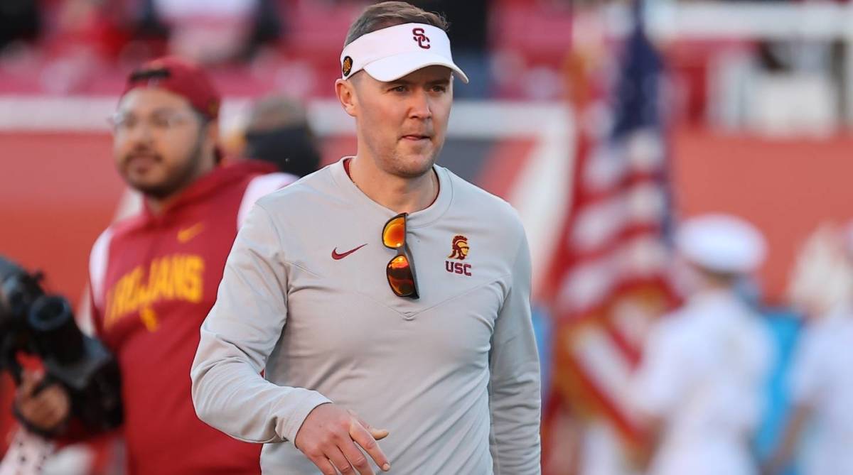 USC head coach Lincoln Riley walks on the field before a game vs. Utah.