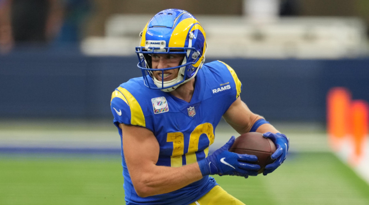 Rams wide receiver Cooper Kupp runs with the ball after a catch.