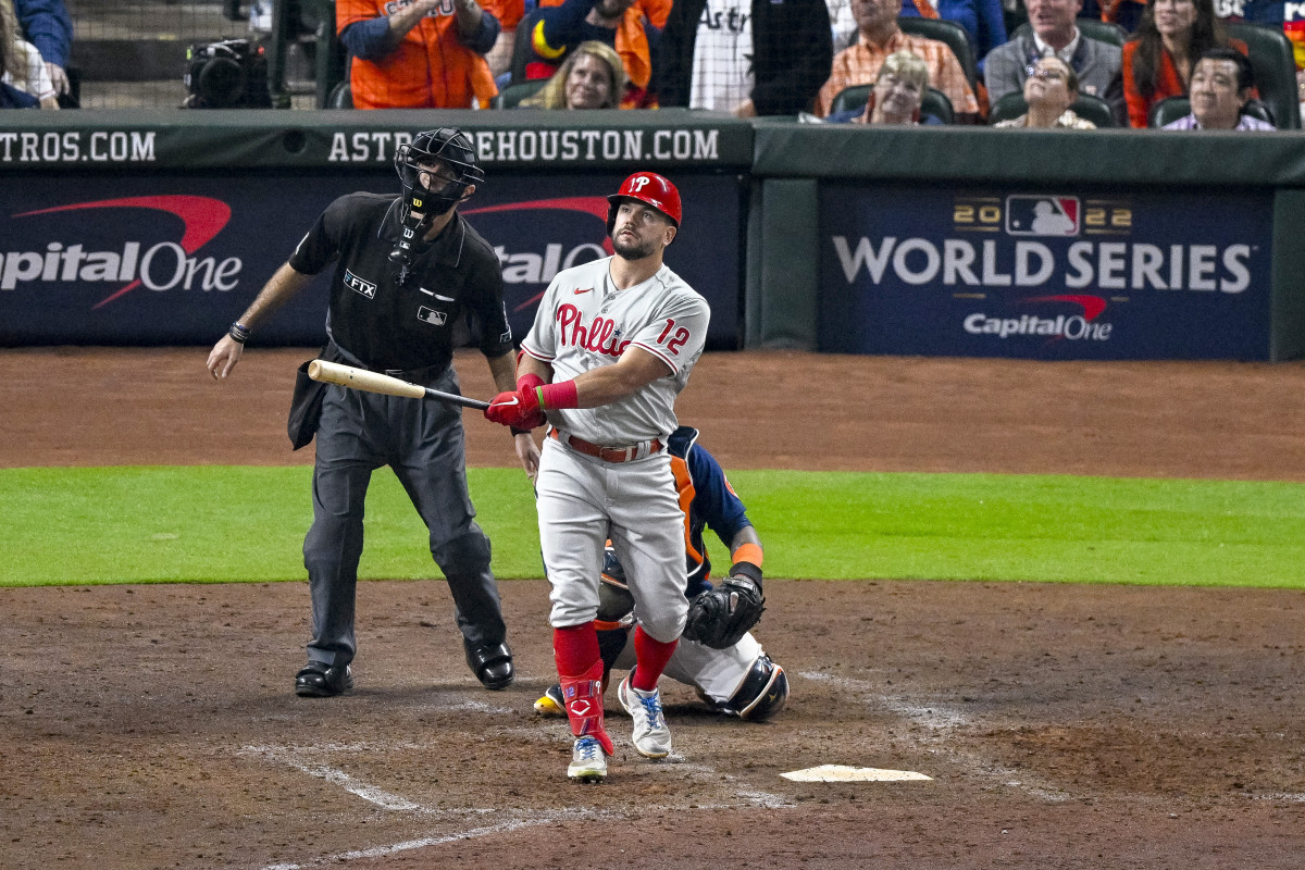 Phillies left fielder Kyle Schwarber and home plate umpire Pat Hoberg watch as a ball hit by Schwarber goes foul.