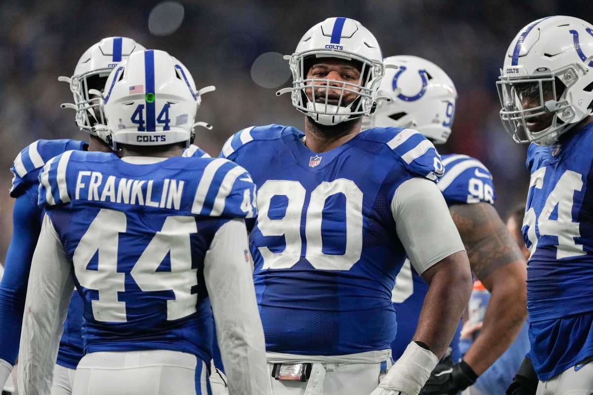 Indianapolis Colts defensive tackle Grover Stewart (90) stands in the huddle Sunday, Oct. 30, 2022, during a game against the Washington Commanders at Indianapolis Colts at Lucas Oil Stadium in Indianapolis.