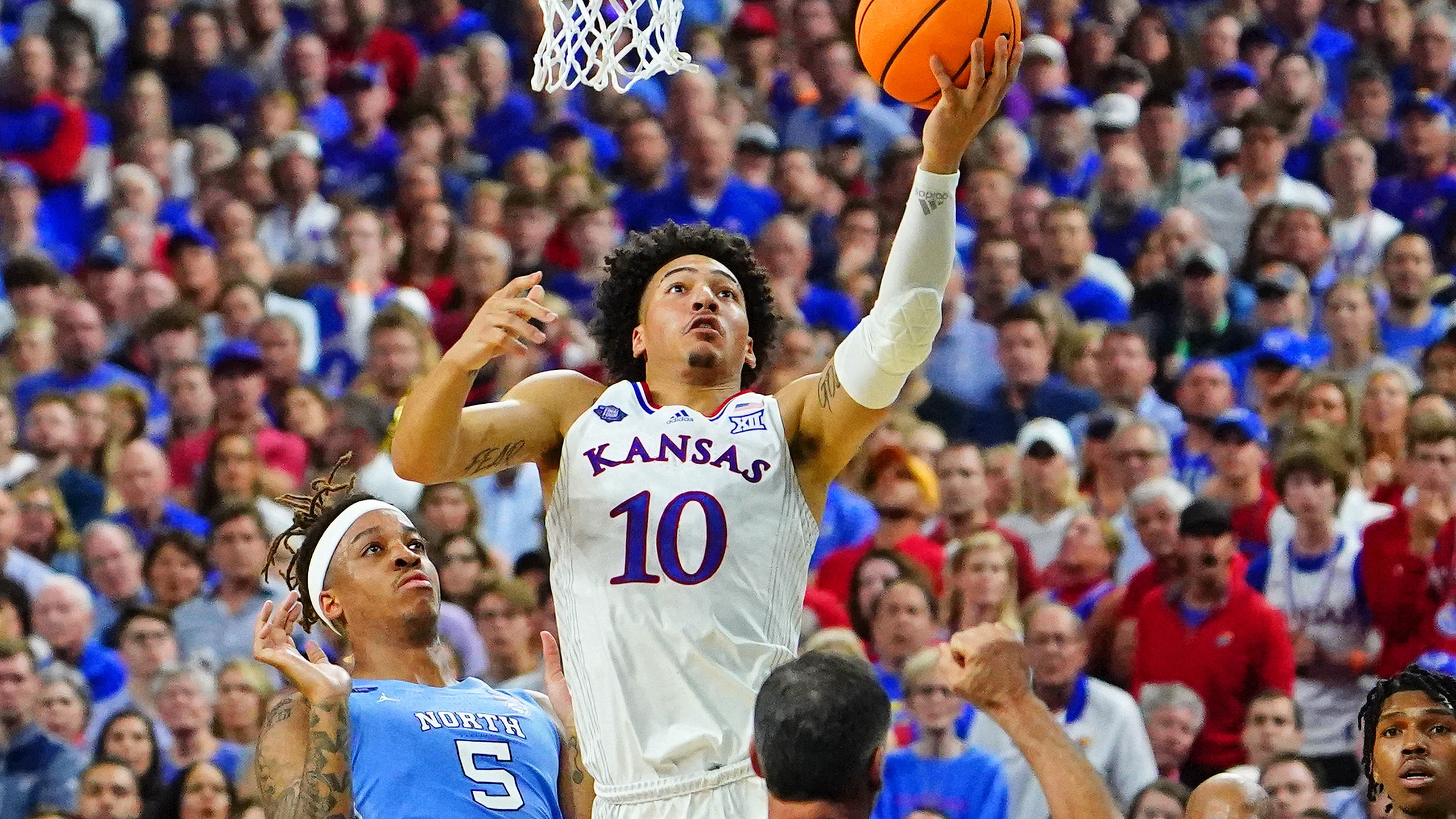 Kansas’s Jalen Wilson puts up a layup