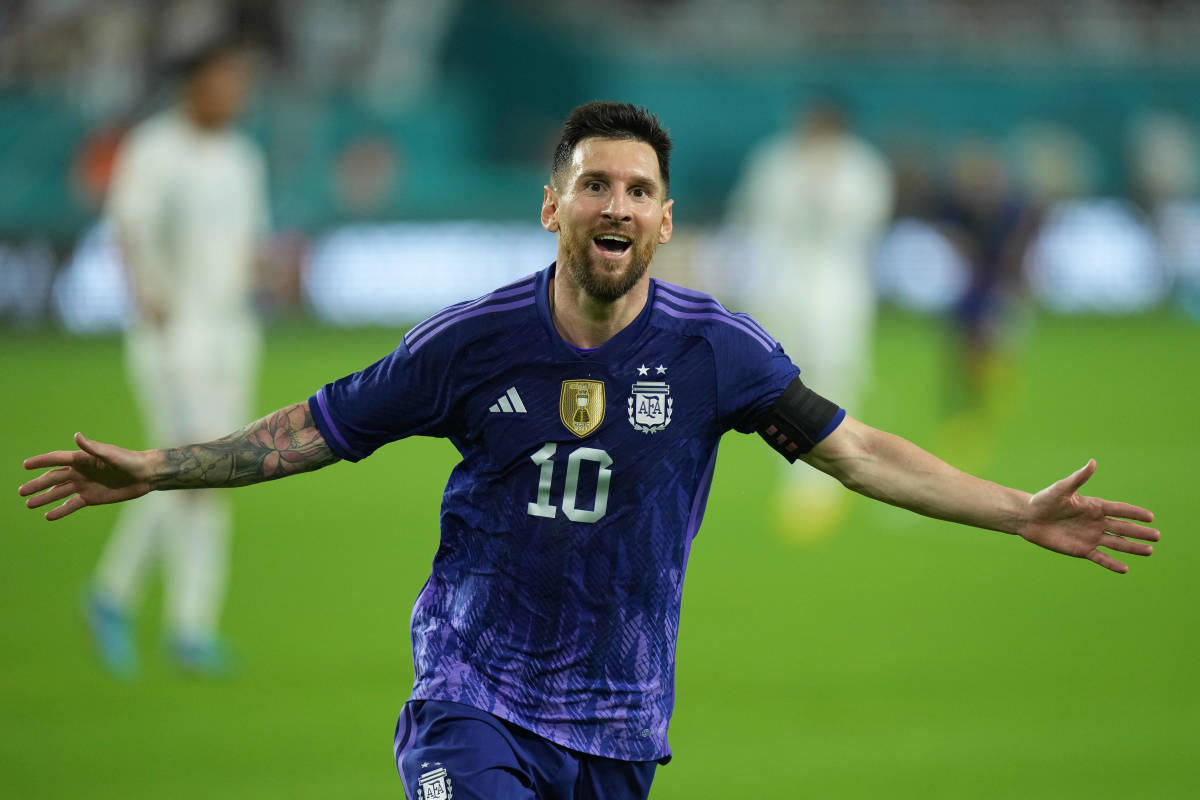 Lionel Messi pictured celebrating after scoring two goals for Argentina against Honduras in September 2022