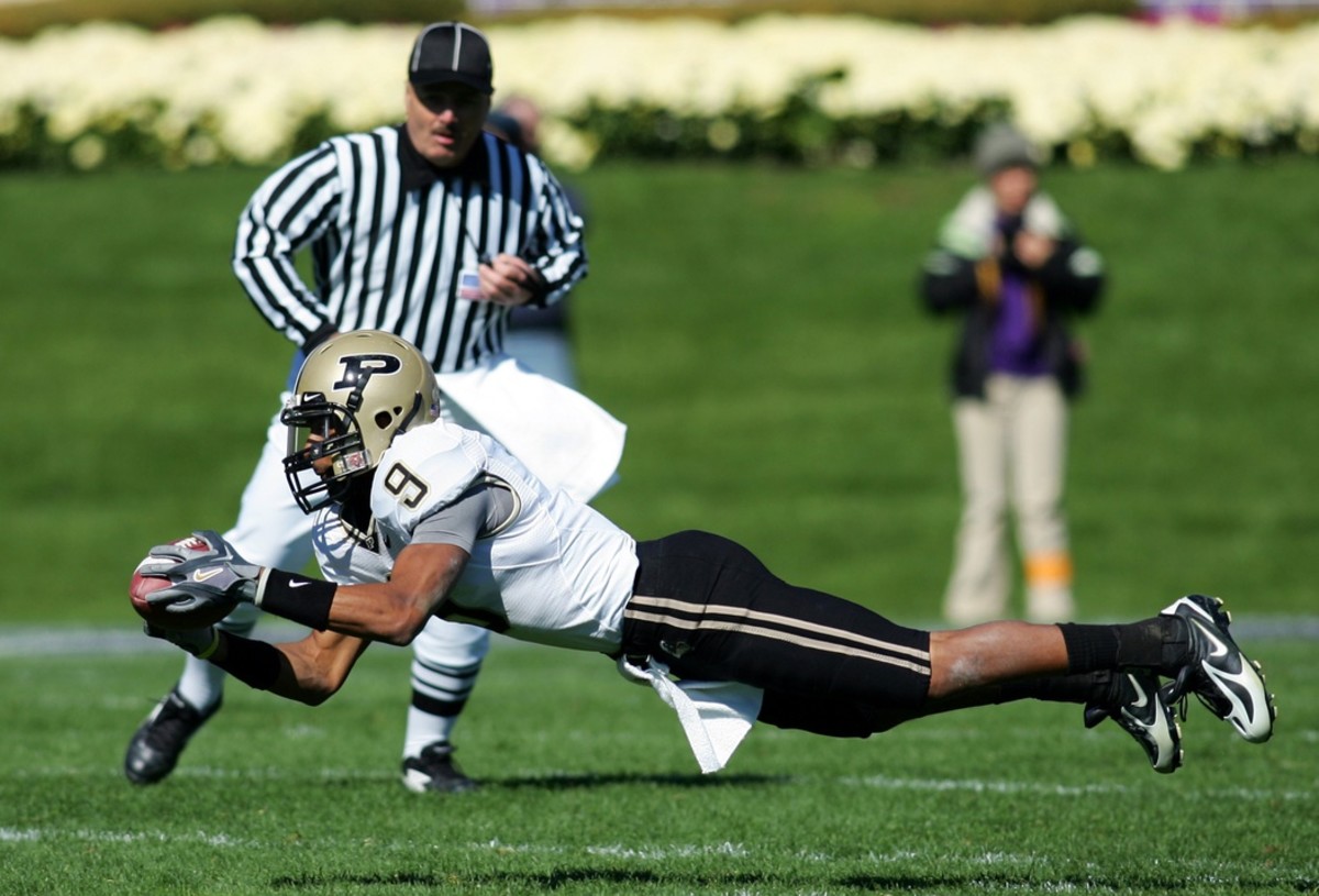 Oct 14, 2006; Evanston, IL, USA; Purdue Boilermakers wide receiver (9) Dorien Bryant makes a diving catch during the second quarter at Ryan Field in Evanston, IL. Purdue defeated Northwestern 31-10.