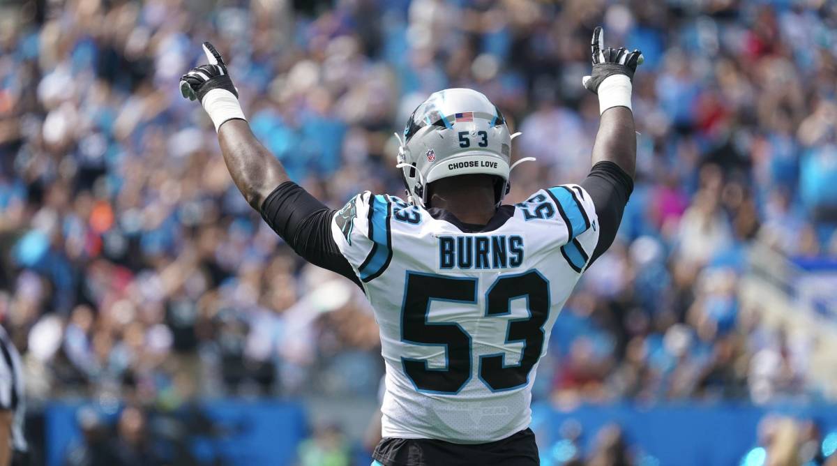 Panthers pass rusher Brian Burns salutes the crowd after a turnover vs. the New Orleans Saints.
