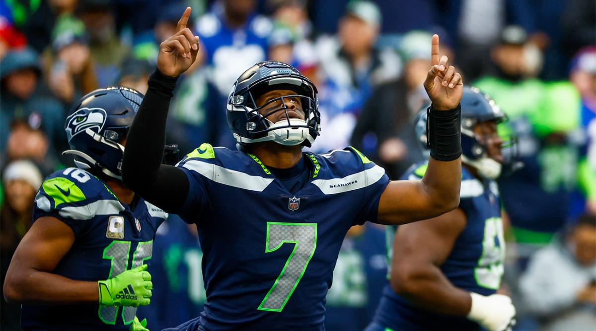 Oct 30, 2022; Seattle, Washington, USA; Seattle Seahawks quarterback Geno Smith (7) celebrates after throwing a touchdown pass against the New York Giants during the fourth quarter at Lumen Field.
