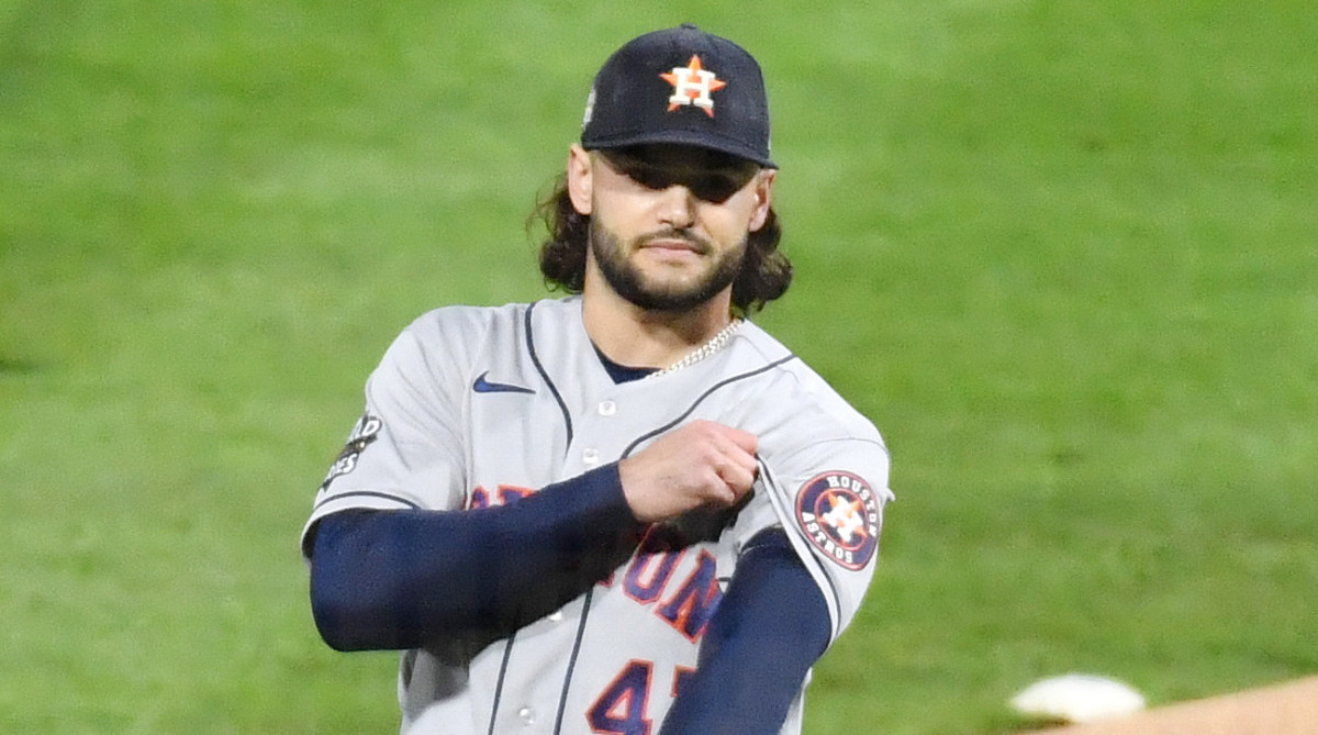 Astros pitcher Lance McCullers grimaces after giving up a home run to Bryce Harper in the first inning of Game 3 of the 2022 World Series.