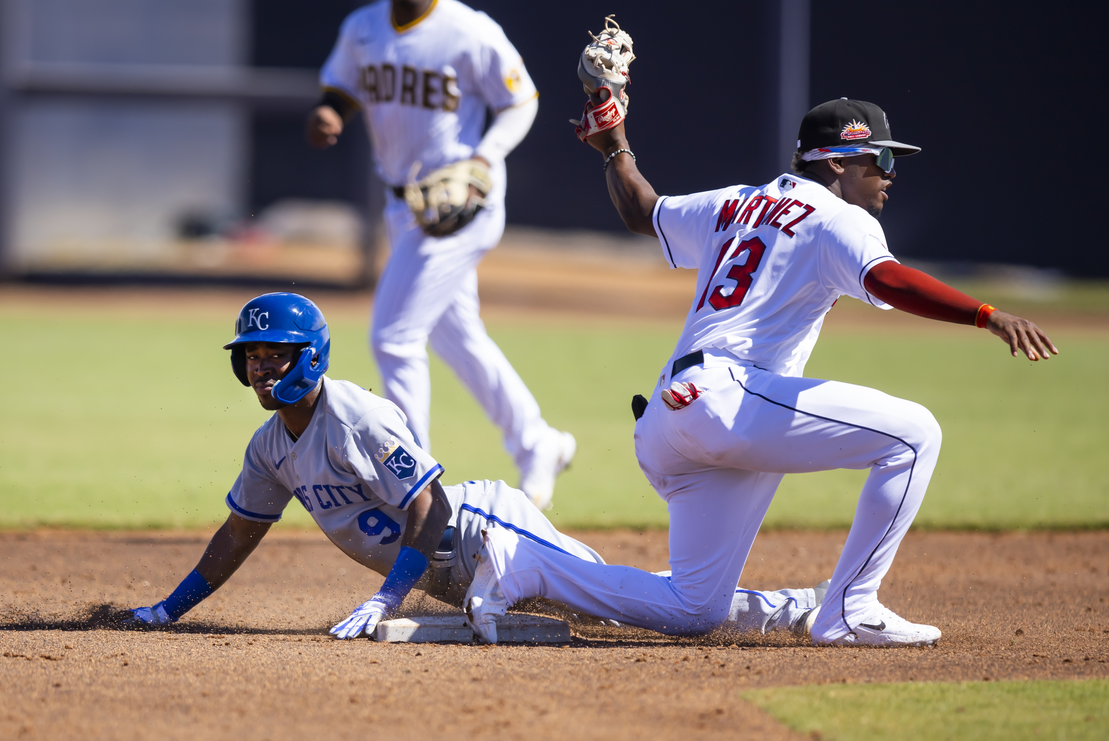Oct 7, 2022; Peoria, Arizona, USA; Kansas City Royals infielder Samad Taylor (9) of the Surprise Saguaros steals second base ahead of the tag by Cleveland Guardians infielder Angel Martinez for the Peoria Javelinas during an Arizona Fall League baseball game at Peoria Sports Complex. Mandatory Credit: Mark J. Rebilas-USA TODAY Sports