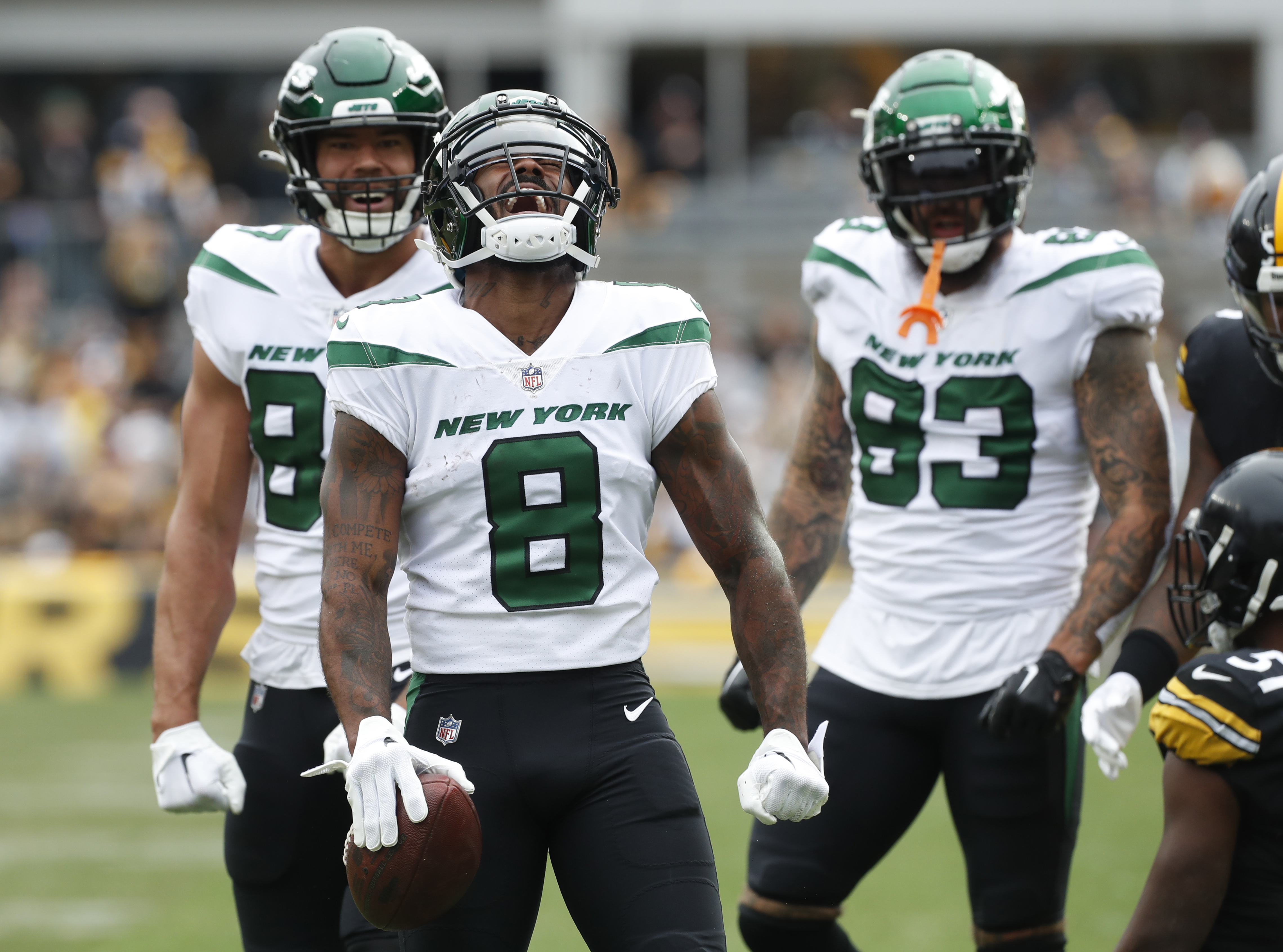 New York Jets wide receiver Elijah Moore (8) reacts after a catch against the Pittsburgh Steelers during the first quarter at Acrisure Stadium.