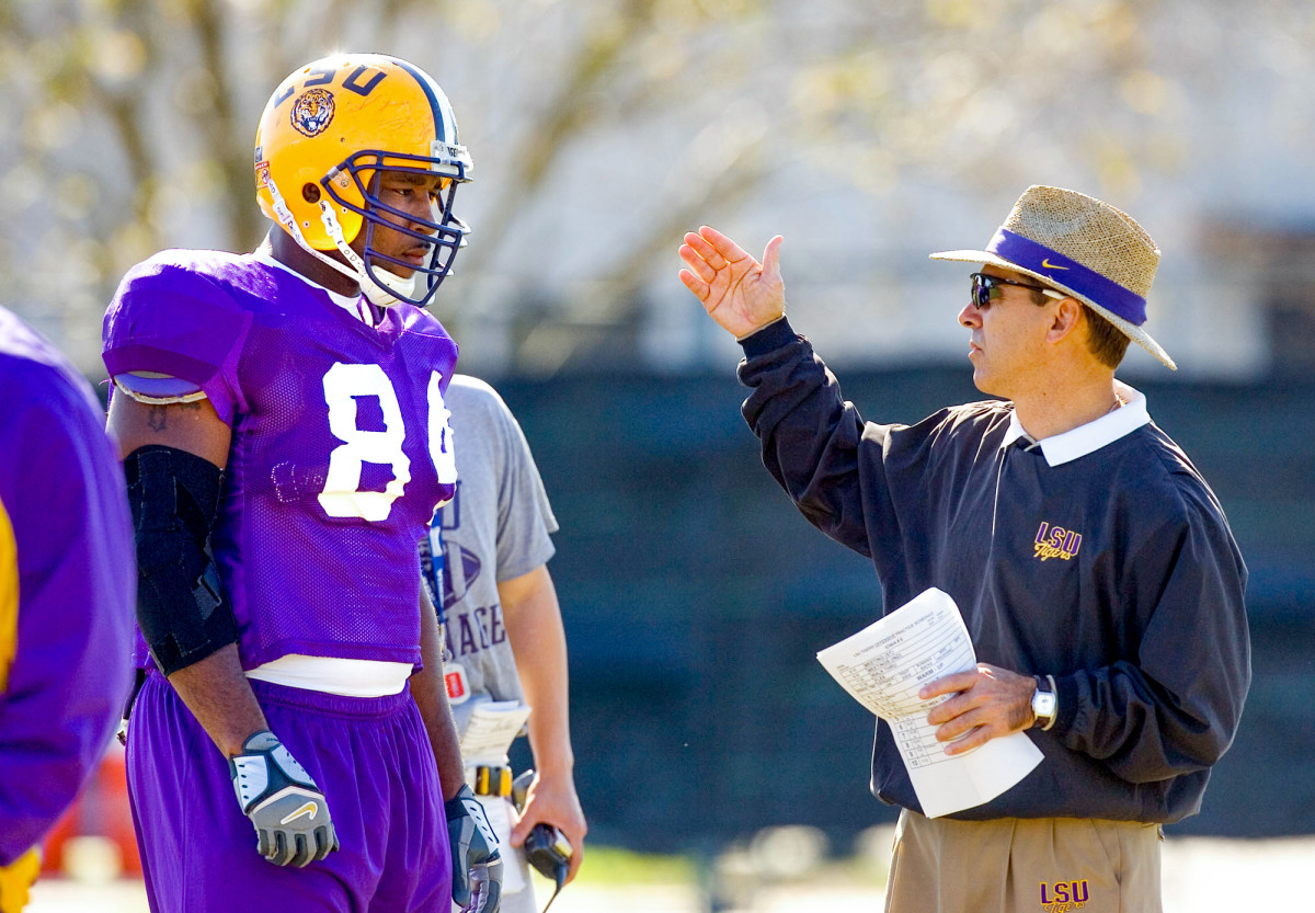Nick Saban coaches a player during a summer practice during his days at LSU.