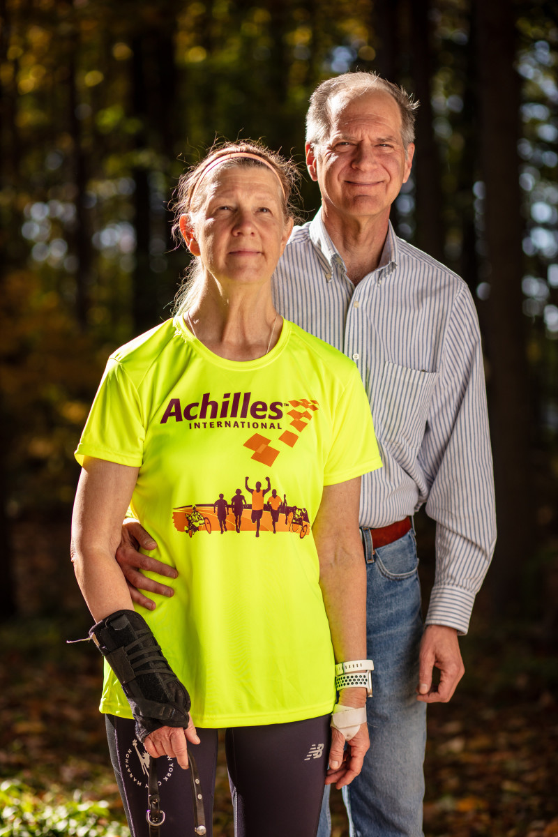 Helminski, with her husband, Ron, was encouraged to race New York by peers at Achilles International, an organization that helps people with disabilities participate in endurance events.