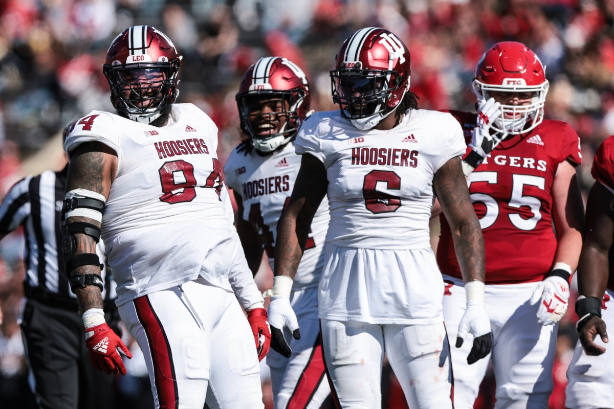 Indiana Hoosiers defensive lineman Demarcus Elliott (94) reacts after a defensive stop with defensive lineman James Head Jr. (6) and linebacker Aaron Casey (44) during the first half against the Rutgers Scarlet Knights at SHI Stadium.