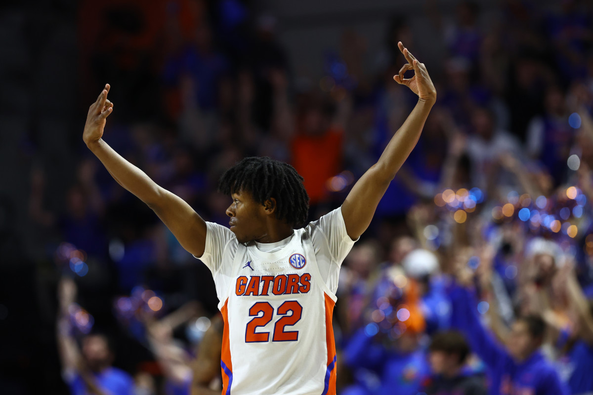 #22 Ty Appleby celebrates a three point make for Florida last season