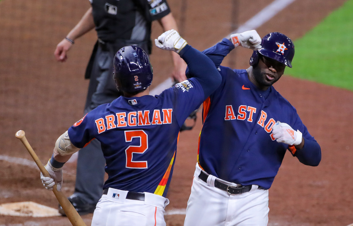 Houston Astros left fielder Yordan Alvarez (44) celebrates with third baseman Alex Bregman (2) after hitting a three run home run against the Philadelphia Phillies during the sixth inning in game six ...